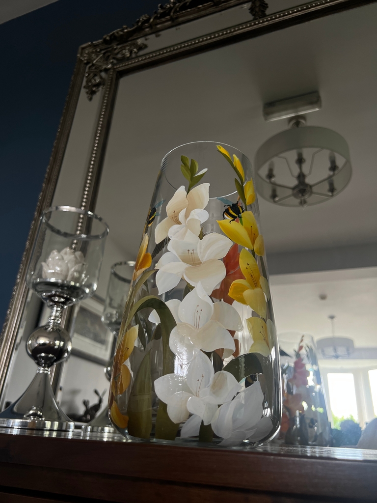 White and yellow irises with bees and swallows