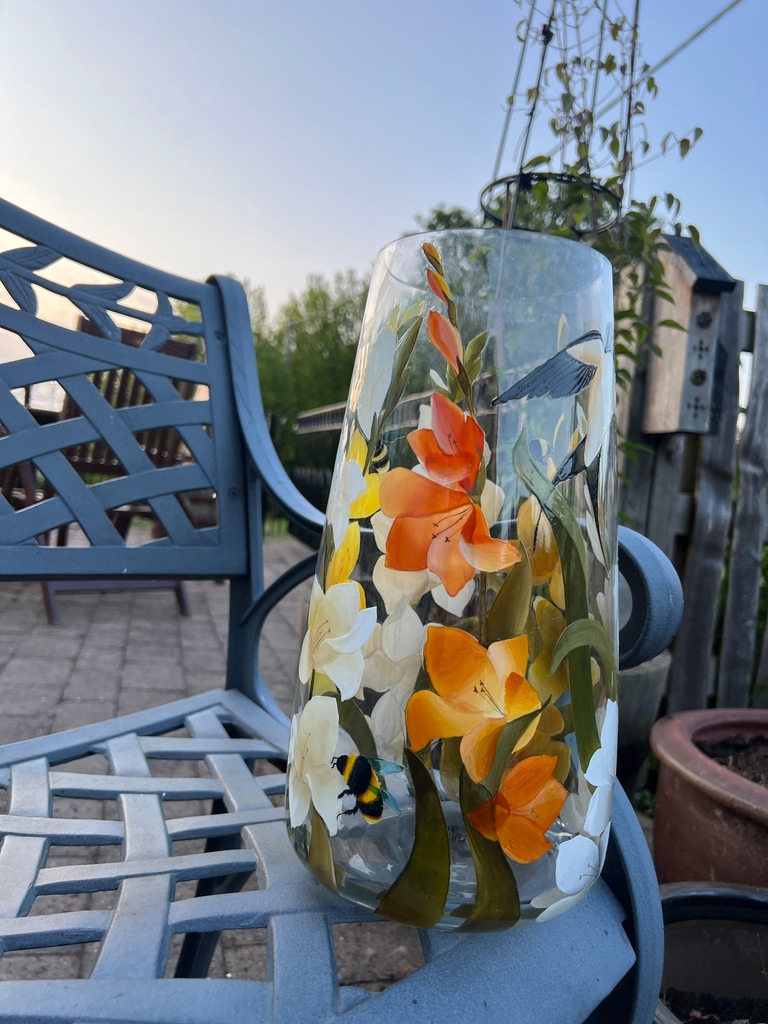 White and yellow irises with bees and swallows